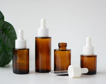 Amberkleurige glazen druppelflesjes met platte schouder 20 ml 30 ml 50 ml 60 ml 80 ml 100 ml, witte druppeldop hervulbare huidverzorgingsserumflesjes