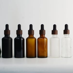 50ml 2oz Empty Dropper Bottles Matte/Shiny Black Amber Frosted Boston Bottle Black Wood Grain Dropper For Man Skin Care Cosmetic Packaging