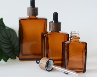 30ml 50ml 100ml Empty Dropper Bottle Square Amber Glass With Natural Black Wooden Cap Black Rubber Cosmetic Safety Level Bulk Order