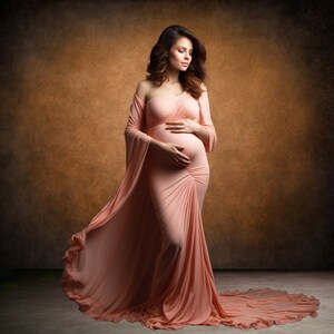 May include: A pregnant woman in a peach-colored, flowing gown with a one-shoulder design. She is standing in front of a brown background and holding her belly.