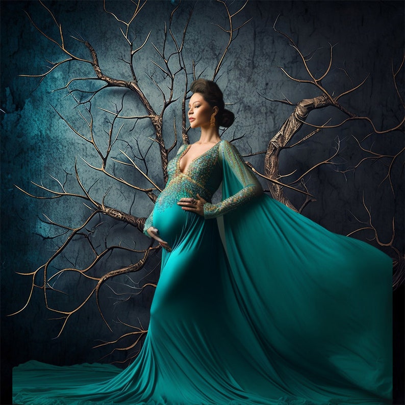 May include: A pregnant woman in a teal blue gown with a long train and gold embellishments. She is standing in front of a dark background with a bare tree behind her.