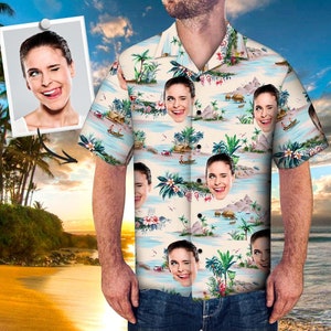 May include: A white button-down shirt with a tropical print featuring multiple images of a woman's face. The print includes palm trees, boats, and huts.