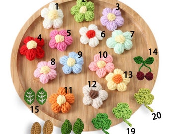 Agregue flores u hojas (para suéteres bordados con el nombre del bebé)