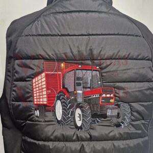 Large back logo embroidery of Case tractor with trailer, fully stitched and digitized with amazing results, custom jacket embroidery design, detailed image digitizing, and professional logo digitizing artwork by Las Vegas Designs USA.