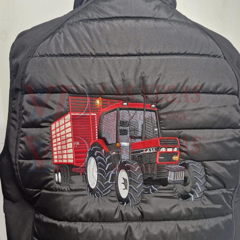 Large back logo embroidery of Case tractor with trailer, fully stitched and digitized with amazing results, custom jacket embroidery design, detailed image digitizing, and professional logo digitizing artwork by Las Vegas Designs USA.