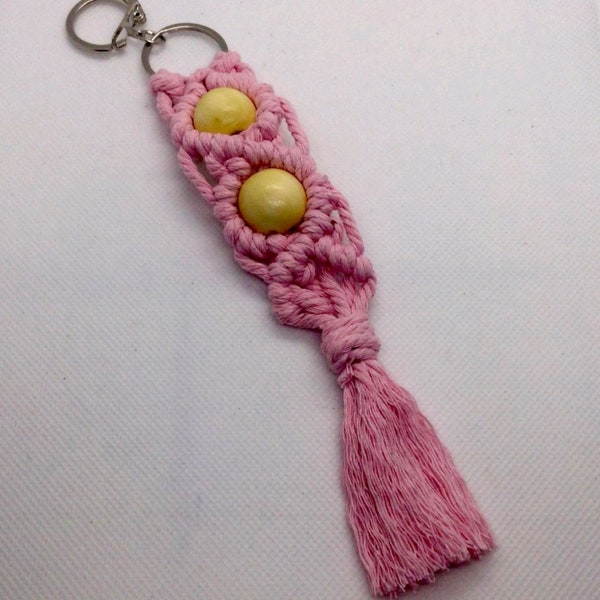 Chunky macramé  keyring in pink with large wooden beads.