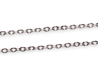 May include: A silver chain necklace with a delicate, linked design.