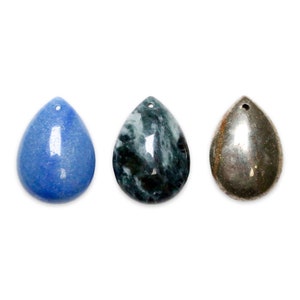 May include: Three teardrop-shaped pendants, one blue, one green with white marbling, and one silver.