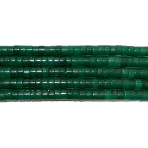 May include: A strand of dark green jade beads, each bead is a cylinder with a slightly rounded edge. The beads are arranged in rows, creating a uniform pattern.