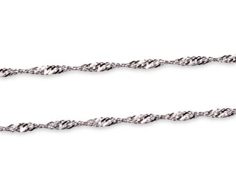 May include: A silver chain necklace with a twisted design.