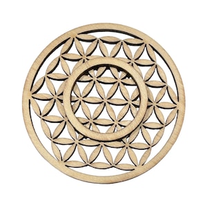 May include: A wooden coaster featuring a double layered flower of life design. The coaster is circular and has a light brown colour.