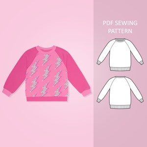 May include: A pink sweatshirt with a white lightning bolt pattern and black polka dots. The sweatshirt has a pink raglan sleeve design. The image also includes a PDF sewing pattern for a sweatshirt.