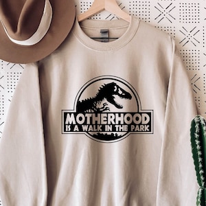 Motherhood is a Walk in the Park Sweatshirt, Mom Life Sweatshirt, Gift for Mom, Dinosaur Mom Sweatshirt,Dinosaur Party Sweatshirt,Mama Shirt
