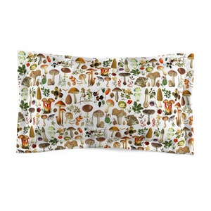 May include: A white pillowcase with a repeating pattern of various mushrooms in shades of brown, red, and white. The mushrooms are surrounded by green leaves and small red berries.