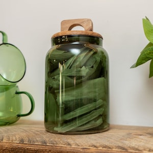 Stylish Green Glass Storage Jar with Chic Wooden Lid