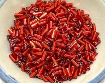 20 gramów pomarańczowo-czerwonych srebrnych koralików w kształcie trąbki o średnicy 4,5 mm (nr BST277-121)