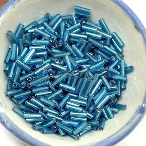 20 Grams of Turquoise Blue Silver Lined Bugle Beads 6mm(No.BST811-144)