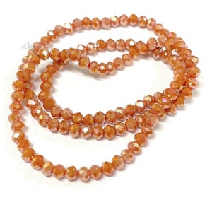 1 Strand of Electroplated Opaque Orange AB 4mm Rondelle Faceted Glass Crystal Beads . No.68-908