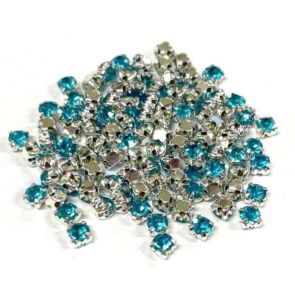 100pcs of Aqua Blue Sew On Crystals Rhinestones with Silver plated Brass setting 5mm Round( No.19-761)