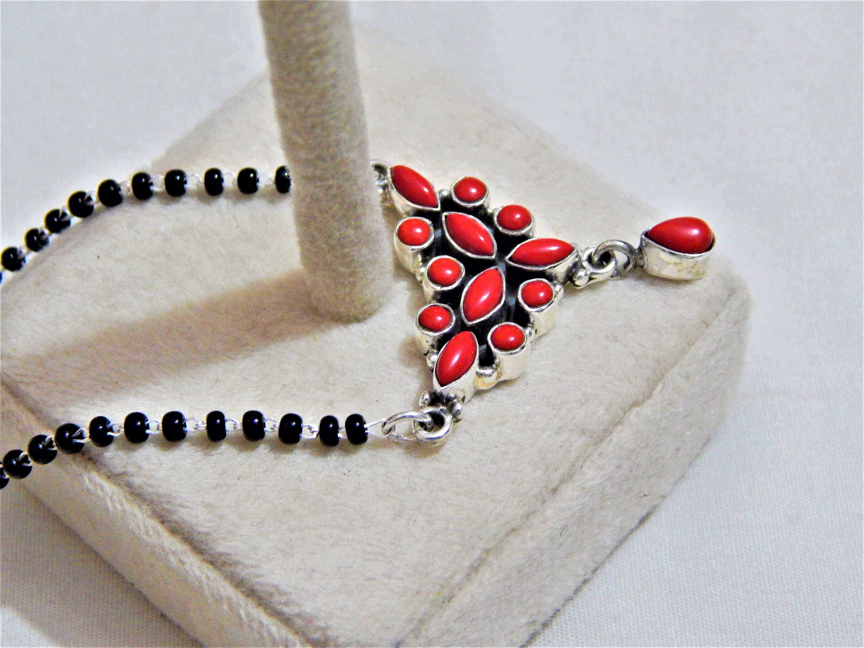 Red coral deals mangalsutra