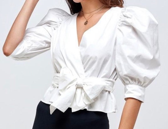 Wrap tops with store puffy sleeves
