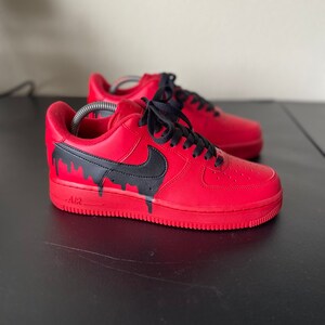 The Black and Red Air Force 1 Sneakers