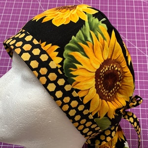 Vibrant Sunflower Ponytail Scrub Cap: Adjustable Tie-Back, Accentuating Cuff