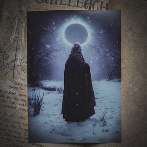 May include: A hooded figure stands in a snowy landscape, looking up at a large, glowing ring in the sky. The scene is dark and atmospheric, with falling snow and a sense of mystery.