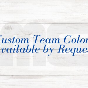 May include: Custom team colors available by request. This text is displayed on a white wood background.