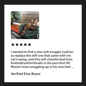 May include: A green knitted cat bed with a cat curled up inside. The bed is made of soft chenille yarn and is perfect for snuggling. The caption reads "I wanted to find a new soft snuggly cushion to replace the stiff one that came with my cat's swing, and this soft chenille bed from KnittedComfortStudio is the purrrfect fit! Mozart loves snuggling up in his new bed... Verified Etsy Buyer"