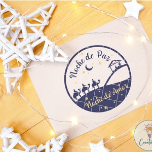 May include: A blue and gold circle with the text "Noche de Paz, Noche de Amor" and a silhouette of the three wise men riding camels towards a star.