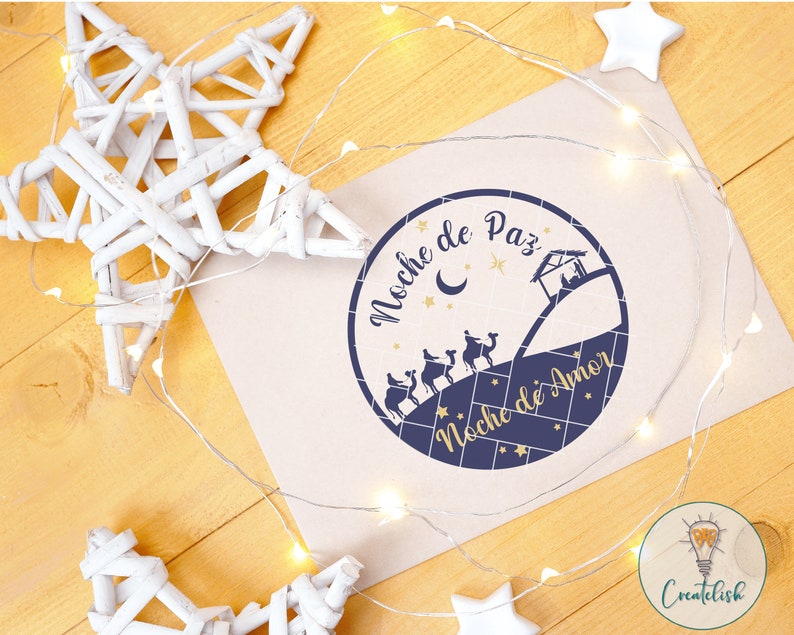 May include: A blue and gold circle with the text "Noche de Paz, Noche de Amor" and a silhouette of the three wise men riding camels towards a star.