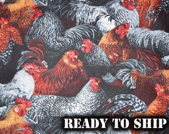 May include: A colorful fabric featuring a repeating pattern of roosters in various poses. The roosters are depicted in shades of red, brown, white, and black.