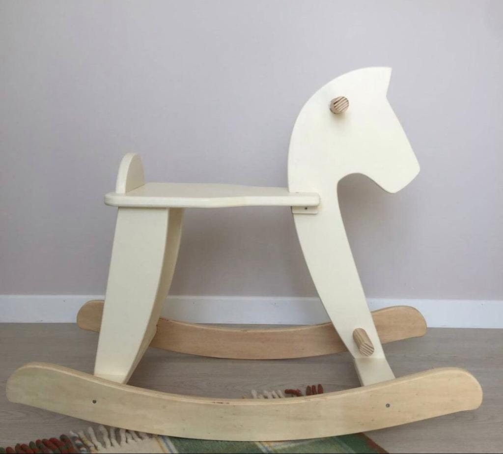 The white hotsell company rocking horse