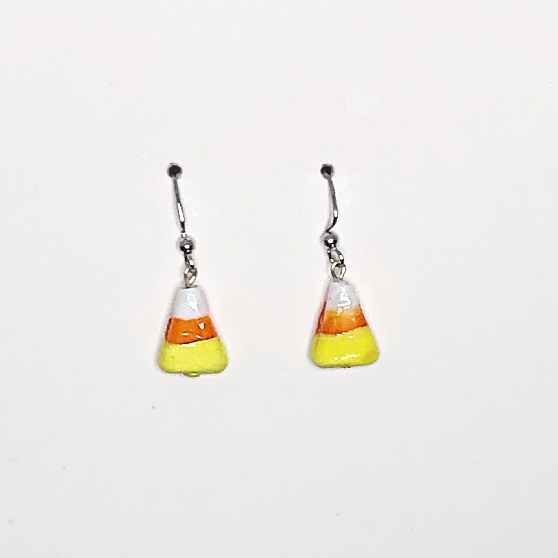 Candy corn dangle earrings Etsy