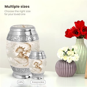 Multiple sizes of baby dragon urns with floral designs, offering a customizable and unique keepsake option for honoring loved ones. Available in large and keepsake sizes.