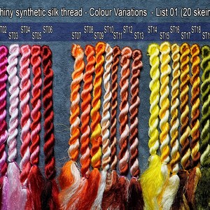 May include: Twenty skeins of shiny synthetic silk thread in a variety of colors, from pink to green. The skeins are labeled with numbers from ST01 to ST20.