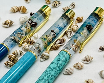 Ocean float pen. Nautical seashells, sand, golden seahorse and seaweed snow globe pens. Hold onto summer a bit longer gift
