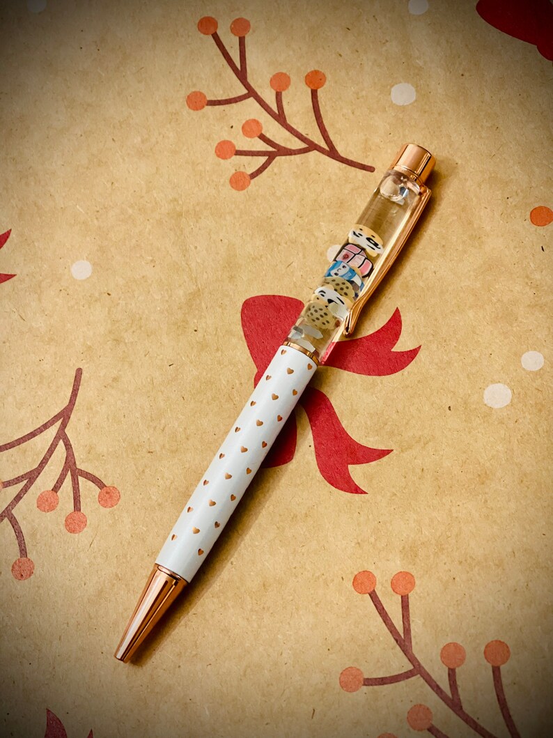 Floating snow globe pen. Kawaii cows, milks and cookies liquid f Floating snow globe pen. Kawaii cows, milks and cookies liquid f