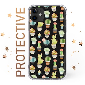 May include: A clear phone case with a black background and a repeating pattern of colorful potted cacti. The case is designed for an iPhone with a camera bump.