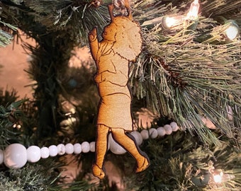 Elaine Benes doing the little kicks wooden Christmas ornament
