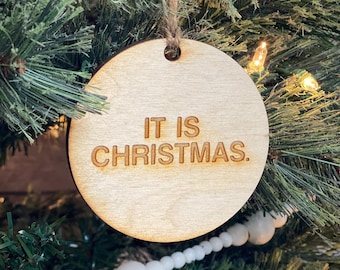 It is Christmas, a wooden Christmas ornament