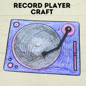 May include: A hand-drawn record player craft with the text "RECORD PLAYER CRAFT" at the top. The record player is coloured with blue and pink markers, featuring a black record and tone arm. The design includes a pink circle and a pink rectangle.