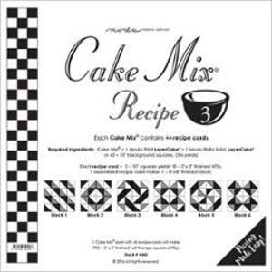 May include: A black and white Cake Mix Recipe card with the text "Cake Mix Recipe" and a bowl graphic. The card includes instructions for making six different quilt blocks, with measurements in inches. A checkerboard pattern runs along the left side.
