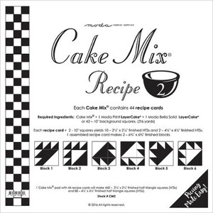 May include: A white square with a black and white checkered border on the left side. The center features the words "Cake Mix Recipe" with a bowl graphic. The text details the contents and instructions for the recipe.