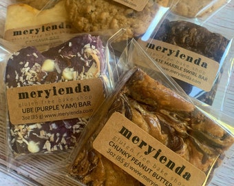 May include: Assortment of gluten-free baked goods from Meryienda Bake Shop.  The selection includes chocolate chip cookies, oatmeal raisin cookies, salted butterscotch cookies, cassava bars, ube bars, marble swirl bars, and chunky peanut butter bars.  Each bar is 3 oz (85 g).
