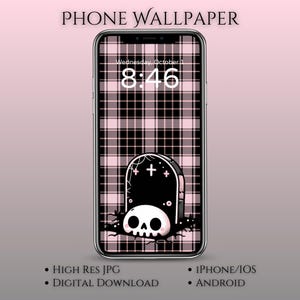 May include: A smartphone displaying a digital wallpaper with a black and pink plaid pattern. The lock screen shows the date and time, with a tombstone and skull graphic. Text at the top reads "PHONE WALLPAPER". Additional text includes "HIGH RES JPG", "DIGITAL DOWNLOAD", "IPHONE/IOS", and "ANDROID".