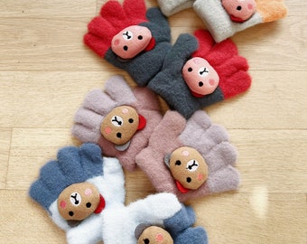 Jolis mini gants d'hiver colorés pour les tout-petits avec des motifs 3D amusants