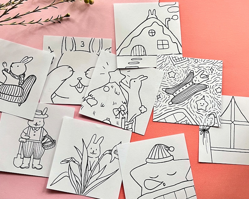May include: A set of ten black and white printable colouring pages featuring various illustrations of bunnies, houses, and other whimsical characters. The pages are numbered 1 through 10.