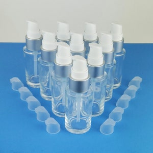 Clear Glass Cosmetic Bottle: 50ml, 24/410, Serum Lotion Container with Silver Pump